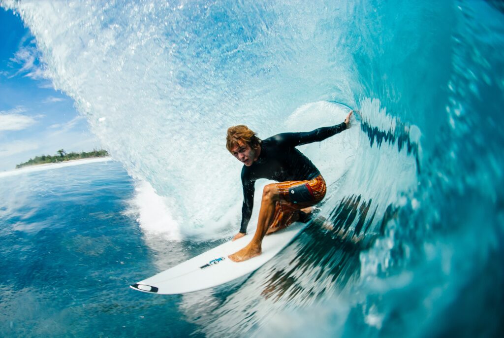 A man surfing at a surf camp in Playa Grande